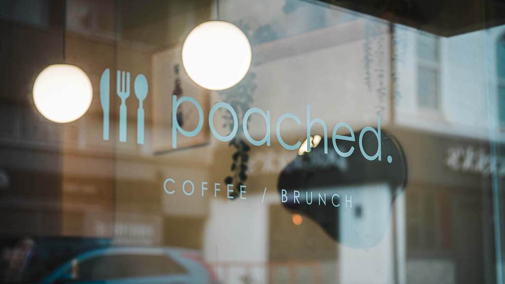 The Poached storefront window in Beckenham